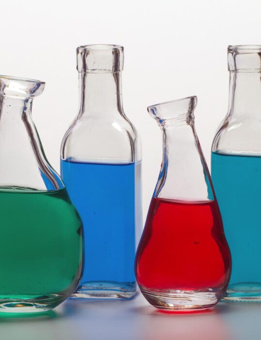 Test tubes and flasks with different coloured liquids in